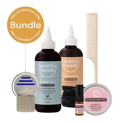 Collection of healthy heads lice control products including bottles, a comb, and hair ties on a white background.