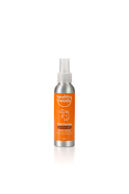 Spray bottle labeled 'healthy heads' on a white background